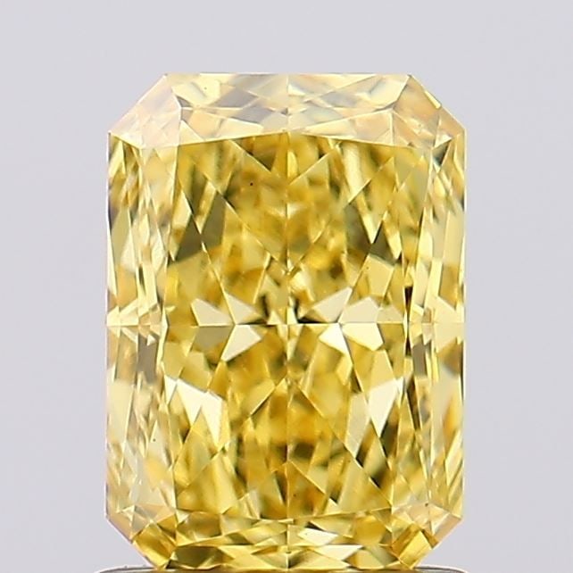 Loose Diamond - RADIANT 1.43ct Fancy Vivid Yellow VS1: Loose Diamond - RADIANT 1.43ct Fancy Vivid Yellow VS1 Source: This is a real non-mined Diamond that has been grown in a lab Shape: RADIANT Carats: 1.43 Color: Fancy Vivid Yellow Certification: IGI Vid