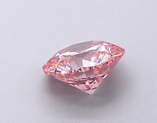 Loose Diamond - ROUND 0.68ct Fancy Light Pink VS1: Loose Diamond - ROUND 0.68ct Fancy Light Pink VS1 Source: This is a real non-mined Diamond that has been grown in a lab Shape: ROUND Carats: 0.68 Color: Fancy Light Pink Certification: IGI Video: