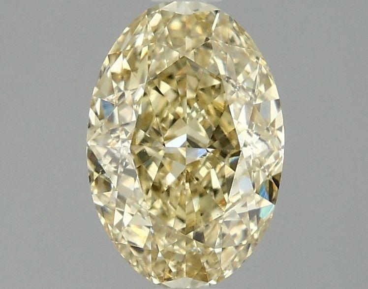 Loose Diamond - OVAL 1.55ct Fancy Intense Yellow VS1: Loose Diamond - OVAL 1.55ct Fancy Intense Yellow VS1 Source: This is a real non-mined Diamond that has been grown in a lab Shape: OVAL Carats: 1.55 Color: Fancy Intense Yellow Certification: IGI Video