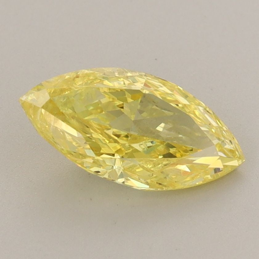 Loose Diamond - MARQUISE 1.33ct Fancy Vivid Yellow I1: Loose Diamond - MARQUISE 1.33ct Fancy Vivid Yellow I1 Source: This is a real non-mined Diamond that has been grown in a lab Shape: MARQUISE Carats: 1.33 Color: Fancy Vivid Yellow Certification: IGI Th