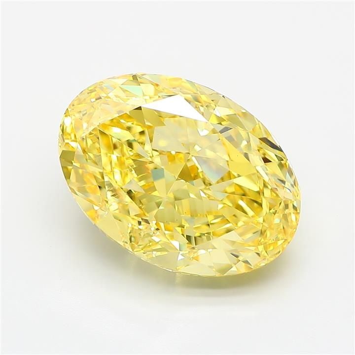 Loose Diamond - OVAL 10.07ct Fancy Vivid Yellow VVS2: Loose Diamond - OVAL 10.07ct Fancy Vivid Yellow VVS2 Source: This is a real non-mined Diamond that has been grown in a lab Shape: OVAL Carats: 10.07 Color: Fancy Vivid Yellow Certification: IGI Video:
