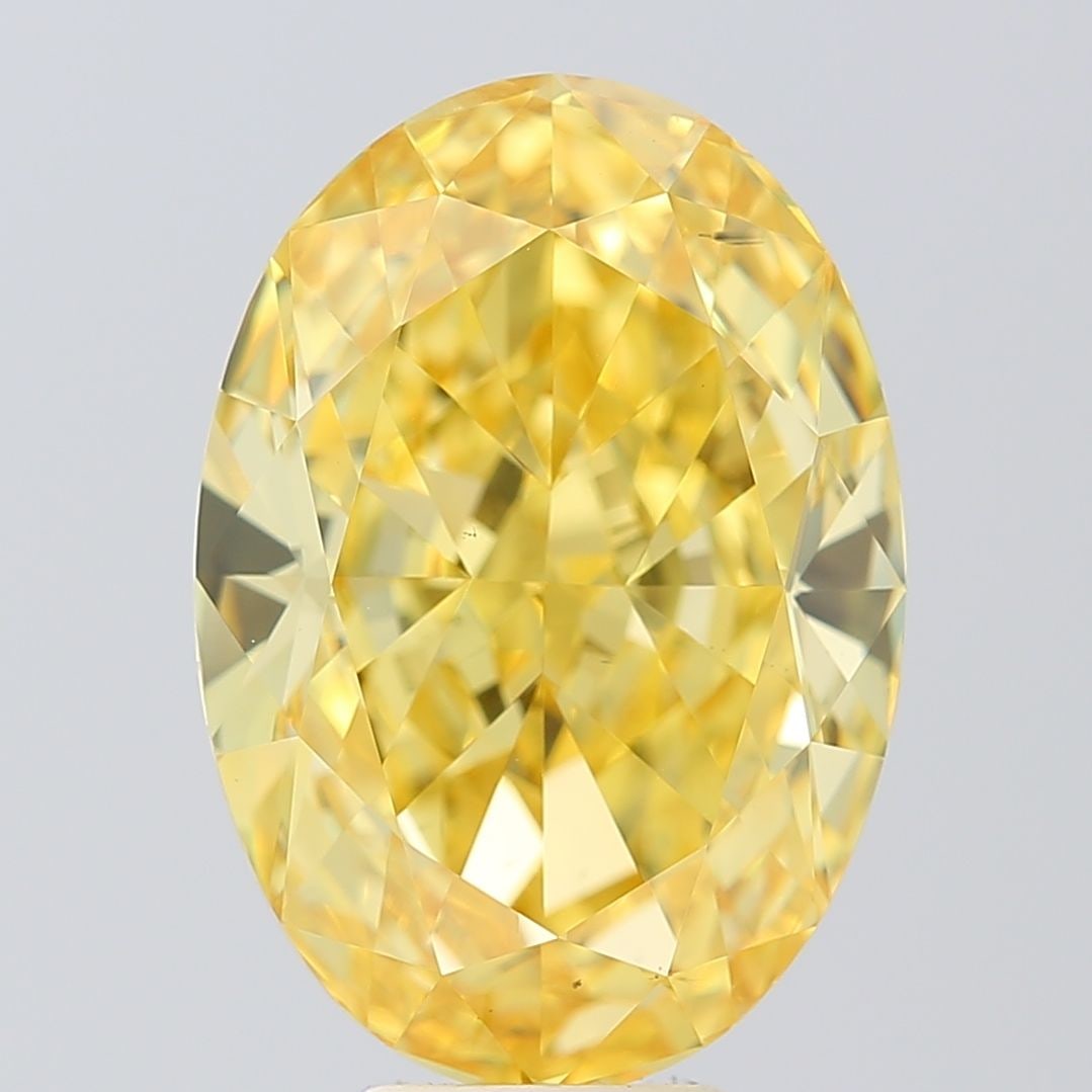 Loose Diamond - OVAL 8.03ct Fancy Vivid Yellow VS2: Loose Diamond - OVAL 8.03ct Fancy Vivid Yellow VS2 Source: This is a real non-mined Diamond that has been grown in a lab Shape: OVAL Carats: 8.03 Color: Fancy Vivid Yellow Certification: IGI Video: