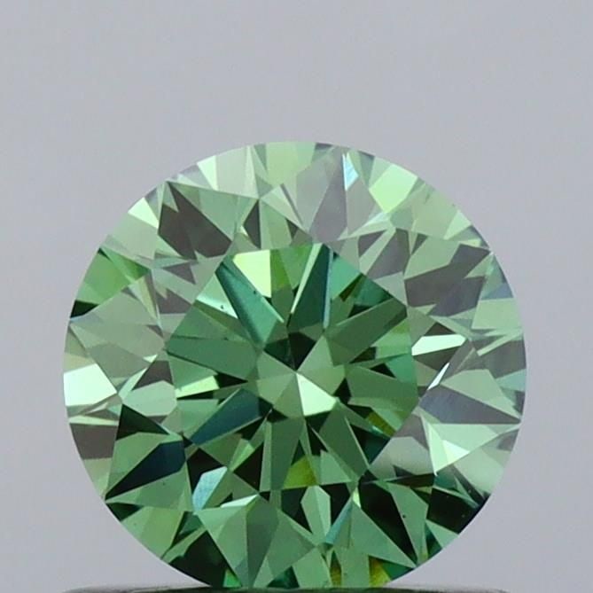 Ideal Loose Diamond - ROUND 0.67ct Fancy Vivid Green VS2: Ideal Loose Diamond - ROUND 0.67ct Fancy Vivid Green VS2 Source: This is a real non-mined Diamond that has been grown in a lab Shape: ROUND Carats: 0.67 Color: Fancy Vivid Green Certification: IGI Vid