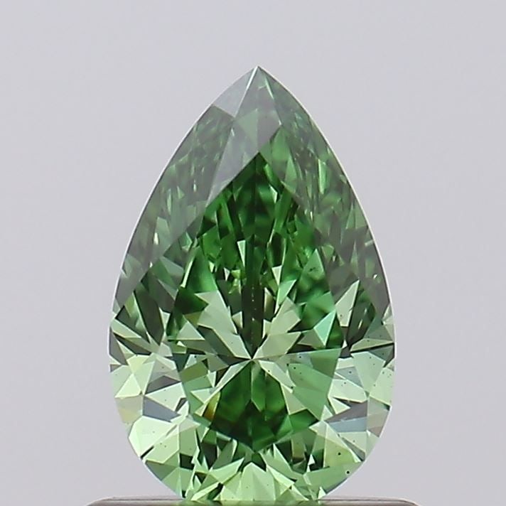 Loose Diamond - PEAR 0.6ct Fancy Vivid Green VS1: Loose Diamond - PEAR 0.6ct Fancy Vivid Green VS1 Source: This is a real non-mined Diamond that has been grown in a lab Shape: PEAR Carats: 0.6 Color: Fancy Vivid Green Certification: IGI Video: