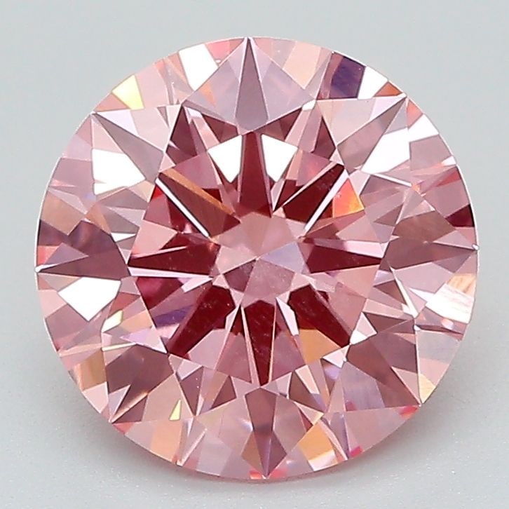 Ideal Loose Diamond - ROUND 2.6ct Fancy Vivid Pink VVS2: Ideal Loose Diamond - ROUND 2.6ct Fancy Vivid Pink VVS2 Source: This is a real non-mined Diamond that has been grown in a lab Shape: ROUND Carats: 2.6 Color: Fancy Vivid Pink Certification: IGI Video: