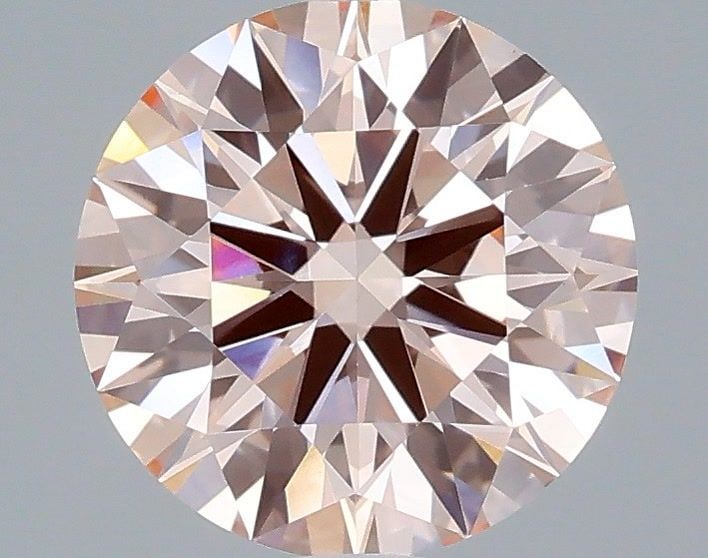 Ideal Loose Diamond - ROUND 2.0ct Fancy Pink VVS2: Ideal Loose Diamond - ROUND 2.0ct Fancy Pink VVS2 Source: This is a real non-mined Diamond that has been grown in a lab Shape: ROUND Carats: 2.0 Color: Fancy Pink Certification: IGI Video: