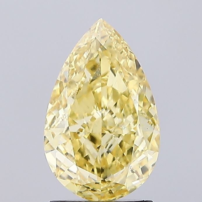 Loose Diamond - PEAR 2.02ct Fancy Vivid Yellow VS1: Loose Diamond - PEAR 2.02ct Fancy Vivid Yellow VS1 Source: This is a real non-mined Diamond that has been grown in a lab Shape: PEAR Carats: 2.02 Color: Fancy Vivid Yellow Certification: IGI Video: