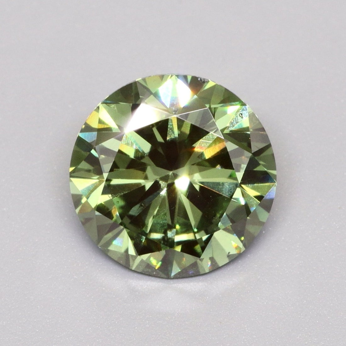 Loose Diamond - ROUND 1.53ct Fancy Vivid Green VS2: Loose Diamond - ROUND 1.53ct Fancy Vivid Green VS2 Source: This is a real non-mined Diamond that has been grown in a lab Shape: ROUND Carats: 1.53 Color: Fancy Vivid Green Certification: IGI Video:
