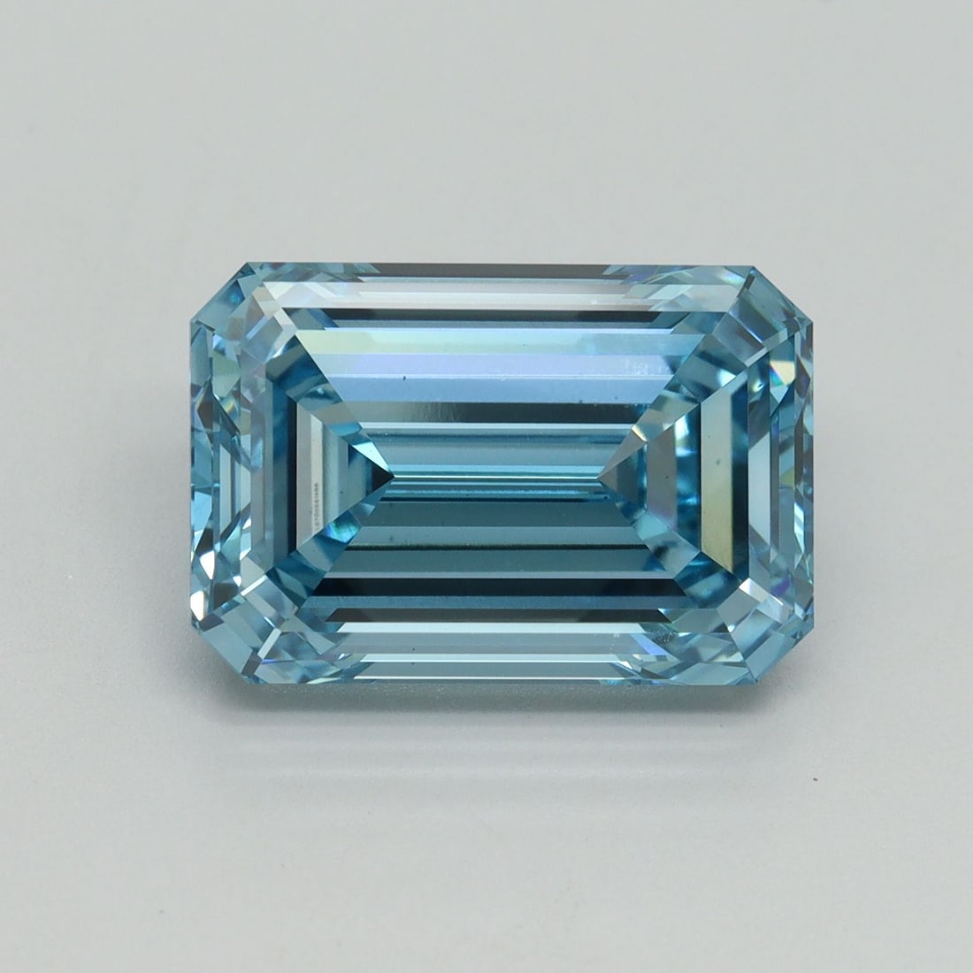 Loose Diamond - EMERALD 7.15ct Fancy Vivid Blue VS1: Loose Diamond - EMERALD 7.15ct Fancy Vivid Blue VS1 Source: This is a real non-mined Diamond that has been grown in a lab Shape: EMERALD Carats: 7.15 Color: Fancy Vivid Blue Certification: IGI Video: