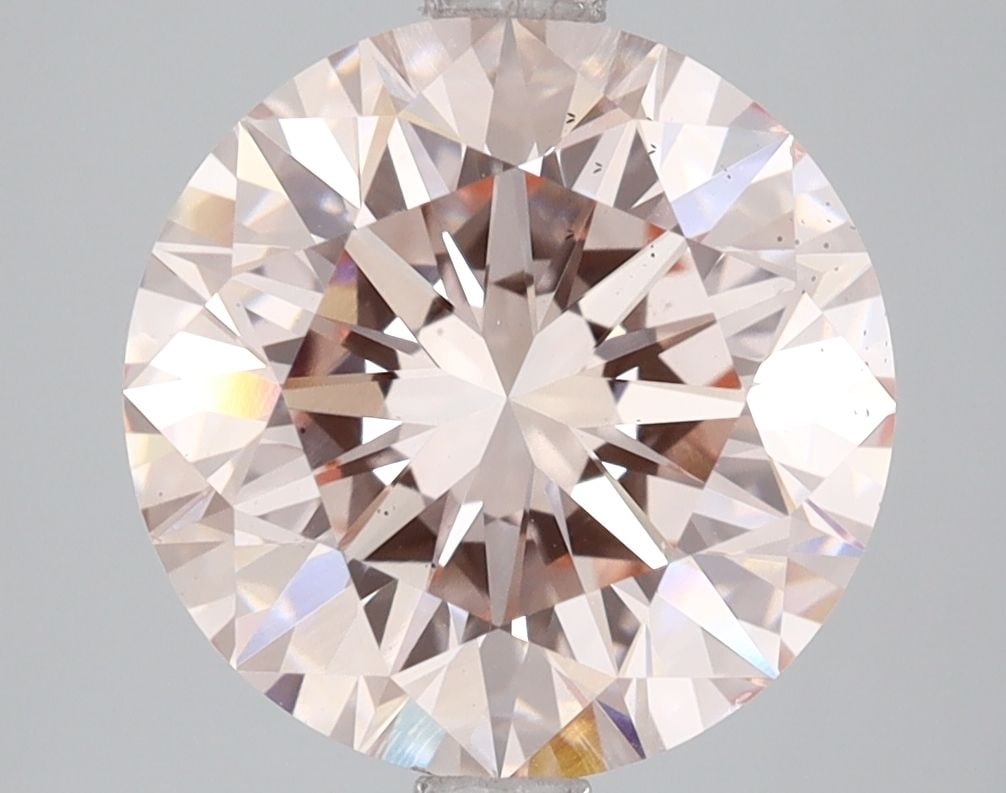 Loose Diamond - ROUND 4.0ct Fancy Light Pink VS2: Loose Diamond - ROUND 4.0ct Fancy Light Pink VS2 Source: This is a real non-mined Diamond that has been grown in a lab Shape: ROUND Carats: 4.0 Color: Fancy Light Pink Certification: IGI Video: