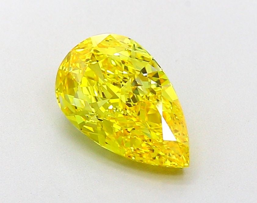 Loose Diamond - PEAR 2.01ct Fancy Vivid Yellow VVS2: Loose Diamond - PEAR 2.01ct Fancy Vivid Yellow VVS2 Source: This is a real non-mined Diamond that has been grown in a lab Shape: PEAR Carats: 2.01 Color: Fancy Vivid Yellow Certification: IGI Video:
