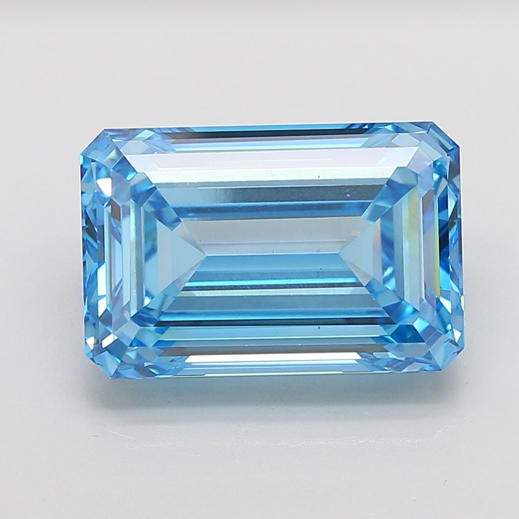 Loose Diamond - EMERALD 15.04ct Fancy Vivid Blue VS1: Loose Diamond - EMERALD 15.04ct Fancy Vivid Blue VS1 Source: This is a real non-mined Diamond that has been grown in a lab Shape: EMERALD Carats: 15.04 Color: Fancy Vivid Blue Certification: IGI Video