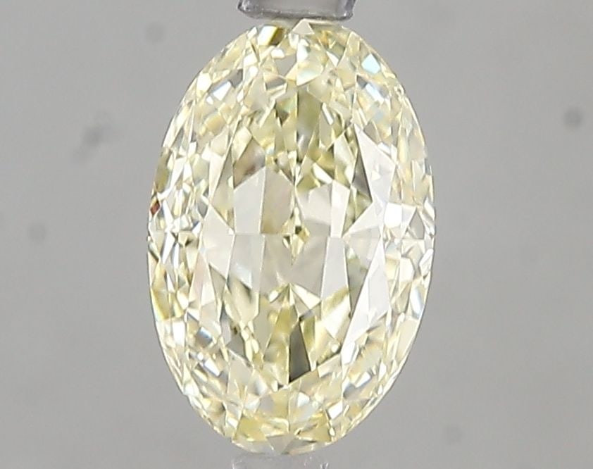 Loose Diamond - OVAL 1.51ct Fancy Yellow VVS2: Loose Diamond - OVAL 1.51ct Fancy Yellow VVS2 Source: This is a real non-mined Diamond that has been grown in a lab Shape: OVAL Carats: 1.51 Color: Fancy Yellow Certification: IGI Video: