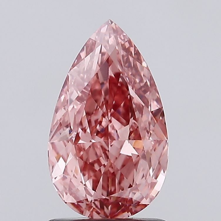 Loose Diamond - PEAR 1.6ct Fancy Vivid Pink VVS2: Loose Diamond - PEAR 1.6ct Fancy Vivid Pink VVS2 Source: This is a real non-mined Diamond that has been grown in a lab Shape: PEAR Carats: 1.6 Color: Fancy Vivid Pink Certification: IGI Video: