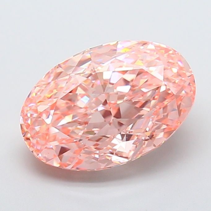 Loose Diamond - OVAL 7.05ct Fancy Vivid Pink VVS2: Loose Diamond - OVAL 7.05ct Fancy Vivid Pink VVS2 Source: This is a real non-mined Diamond that has been grown in a lab Shape: OVAL Carats: 7.05 Color: Fancy Vivid Pink Certification: IGI Video:
