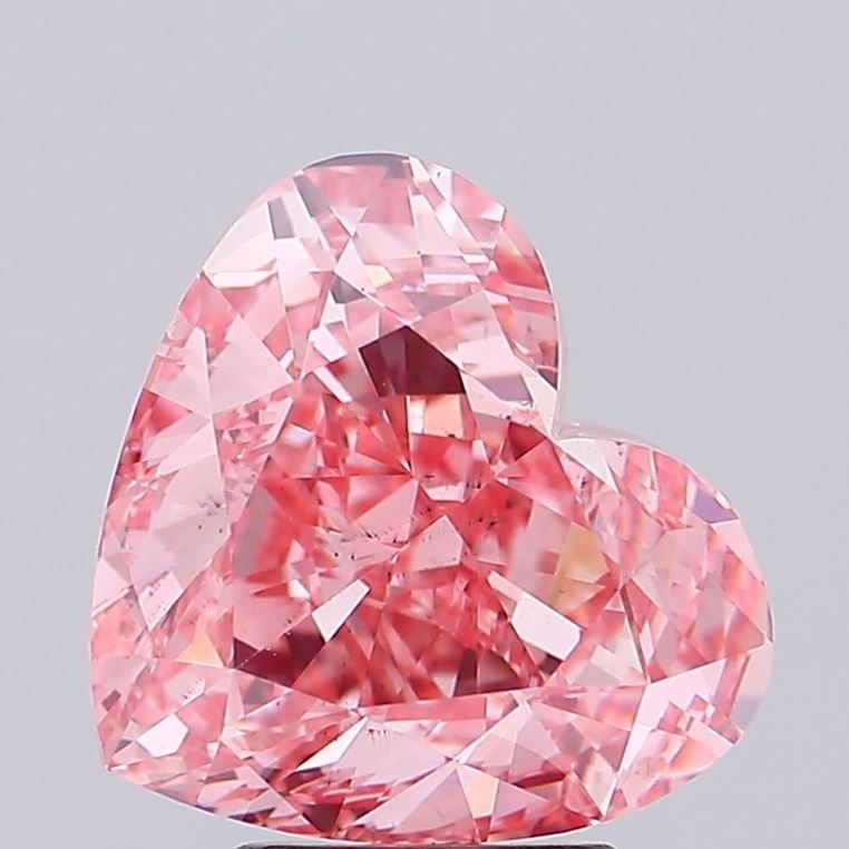 Loose Diamond - HEART 5.02ct Fancy Vivid Pink SI1: Loose Diamond - HEART 5.02ct Fancy Vivid Pink SI1 Source: This is a real non-mined Diamond that has been grown in a lab Shape: HEART Carats: 5.02 Color: Fancy Vivid Pink Certification: IGI Video: