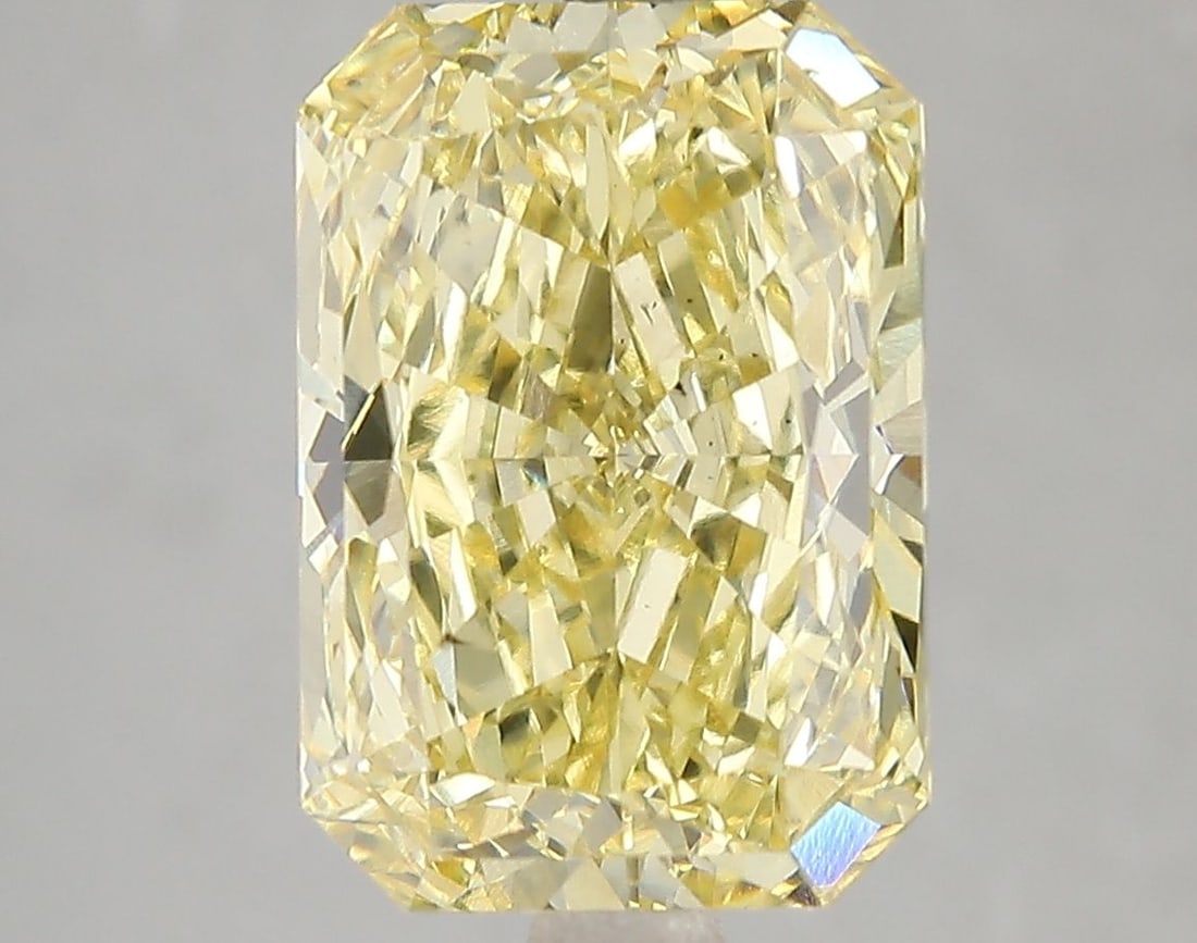 Loose Diamond - RADIANT 5.12ct Fancy Vivid Yellow VS2: Loose Diamond - RADIANT 5.12ct Fancy Vivid Yellow VS2 Source: This is a real non-mined Diamond that has been grown in a lab Shape: RADIANT Carats: 5.12 Color: Fancy Vivid Yellow Certification: IGI Vid