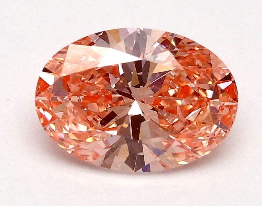 Loose Diamond - OVAL 1.01ct Fancy Vivid Pink VS2: Loose Diamond - OVAL 1.01ct Fancy Vivid Pink VS2 Source: This is a real non-mined Diamond that has been grown in a lab Shape: OVAL Carats: 1.01 Color: Fancy Vivid Pink Certification: IGI Video: