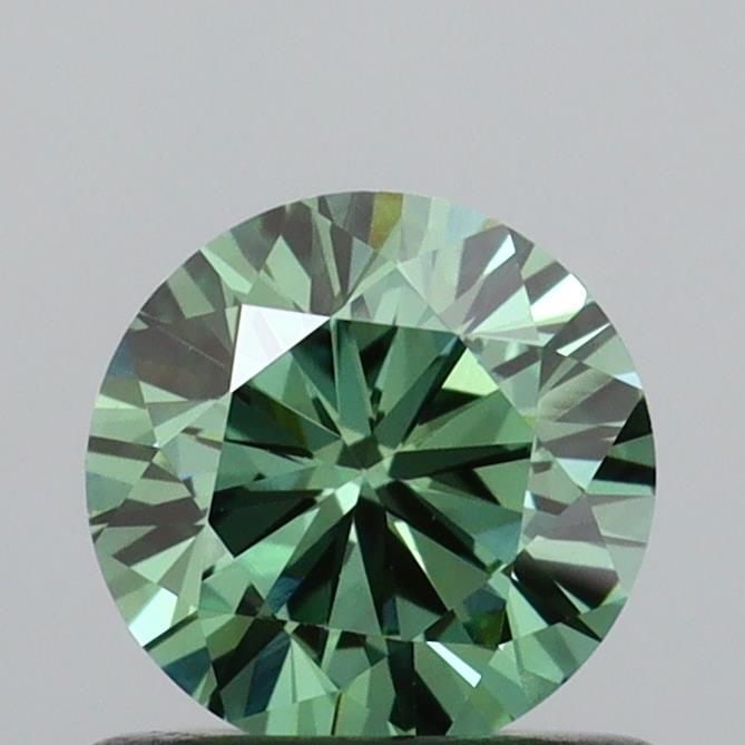 Loose Diamond - ROUND 0.67ct Fancy Vivid Green VS1: Loose Diamond - ROUND 0.67ct Fancy Vivid Green VS1 Source: This is a real non-mined Diamond that has been grown in a lab Shape: ROUND Carats: 0.67 Color: Fancy Vivid Green Certification: IGI Video: