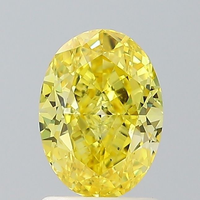 Loose Diamond - OVAL 1.52ct Fancy Vivid Yellow VS1: Loose Diamond - OVAL 1.52ct Fancy Vivid Yellow VS1 Source: This is a real non-mined Diamond that has been grown in a lab Shape: OVAL Carats: 1.52 Color: Fancy Vivid Yellow Certification: IGI Video: