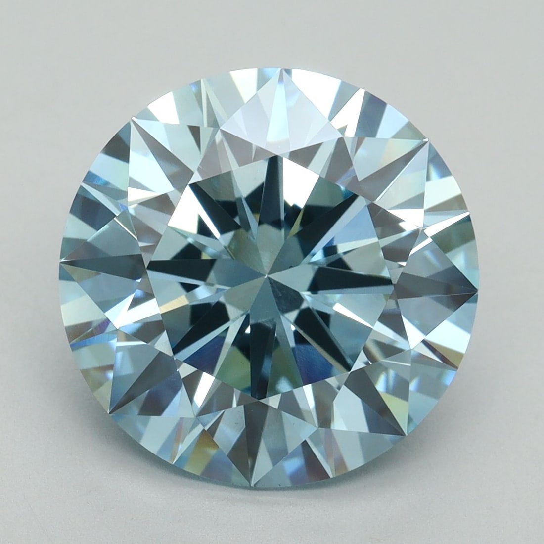 Ideal Loose Diamond - ROUND 7.57ct Fancy Vivid Blue VS1: Ideal Loose Diamond - ROUND 7.57ct Fancy Vivid Blue VS1 Source: This is a real non-mined Diamond that has been grown in a lab Shape: ROUND Carats: 7.57 Color: Fancy Vivid Blue Certification: IGI Video