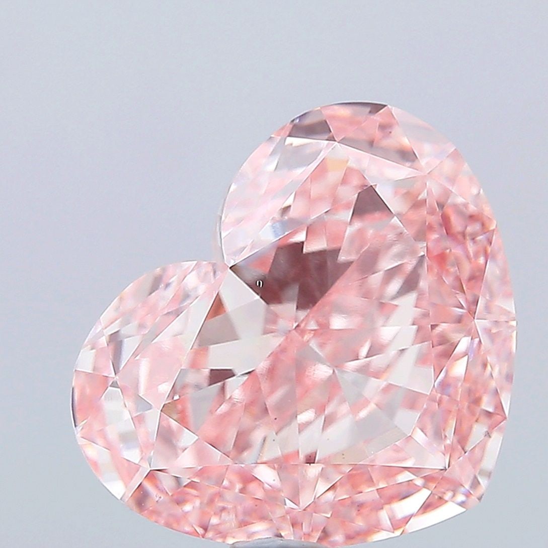 Loose Diamond - HEART 15.06ct Fancy Vivid Pink VS1: Loose Diamond - HEART 15.06ct Fancy Vivid Pink VS1 Source: This is a real non-mined Diamond that has been grown in a lab Shape: HEART Carats: 15.06 Color: Fancy Vivid Pink Certification: IGI Video: