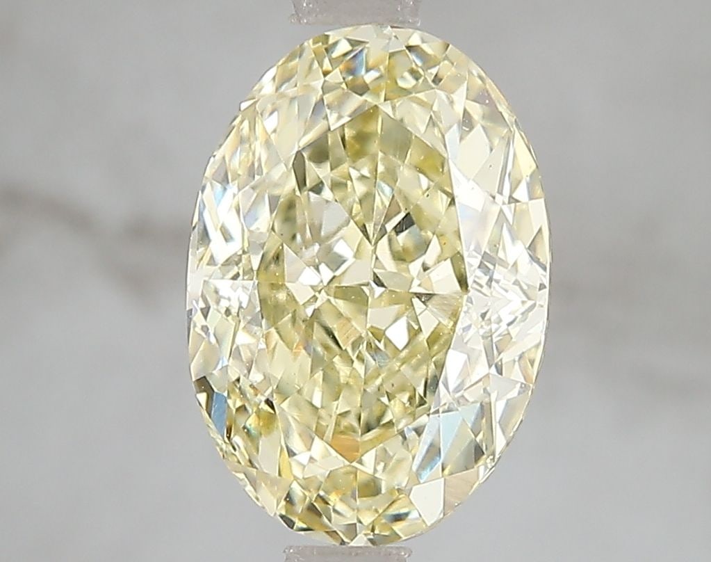 Loose Diamond - OVAL 3.04ct Fancy Intense Yellow VS1: Loose Diamond - OVAL 3.04ct Fancy Intense Yellow VS1 Source: This is a real non-mined Diamond that has been grown in a lab Shape: OVAL Carats: 3.04 Color: Fancy Intense Yellow Certification: IGI Video