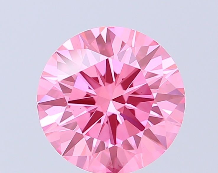 Ideal Loose Diamond - ROUND 1.41ct Fancy Vivid Pink VS2: Ideal Loose Diamond - ROUND 1.41ct Fancy Vivid Pink VS2 Source: This is a real non-mined Diamond that has been grown in a lab Shape: ROUND Carats: 1.41 Color: Fancy Vivid Pink Certification: IGI Video