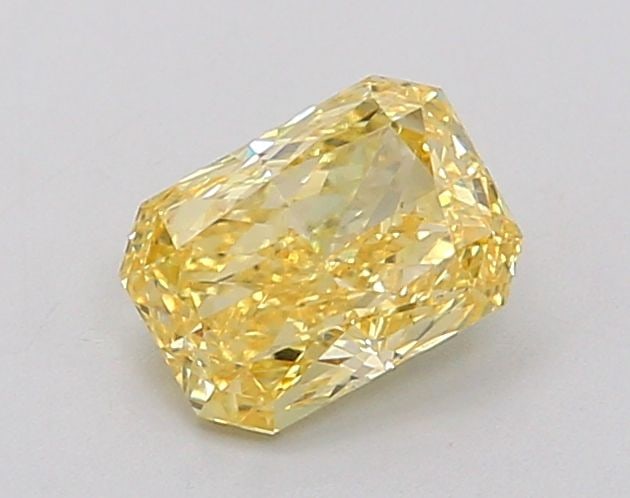 Loose Diamond - RADIANT 0.86ct Fancy Vivid Yellow VS1: Loose Diamond - RADIANT 0.86ct Fancy Vivid Yellow VS1 Source: This is a real non-mined Diamond that has been grown in a lab Shape: RADIANT Carats: 0.86 Color: Fancy Vivid Yellow Certification: IGI Vid