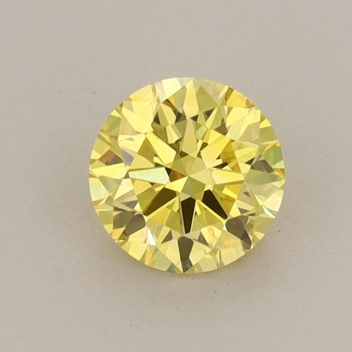 Loose Diamond - ROUND 0.57ct Fancy Vivid Yellow VVS2: Loose Diamond - ROUND 0.57ct Fancy Vivid Yellow VVS2 Source: This is a real non-mined Diamond that has been grown in a lab Shape: ROUND Carats: 0.57 Color: Fancy Vivid Yellow Certification: IGI Video: