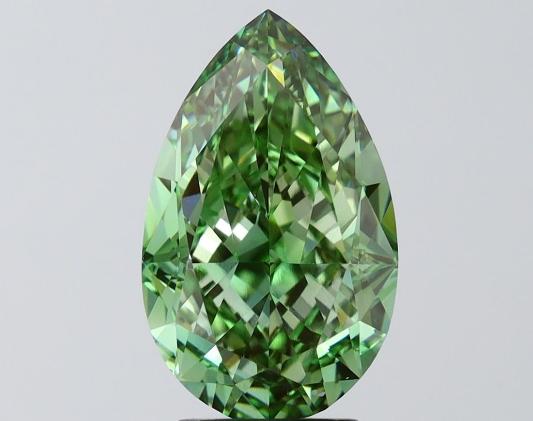 Loose Diamond - PEAR 5.01ct Fancy Vivid Green VVS2: Loose Diamond - PEAR 5.01ct Fancy Vivid Green VVS2 Source: This is a real non-mined Diamond that has been grown in a lab Shape: PEAR Carats: 5.01 Color: Fancy Vivid Green Certification: IGI Video: