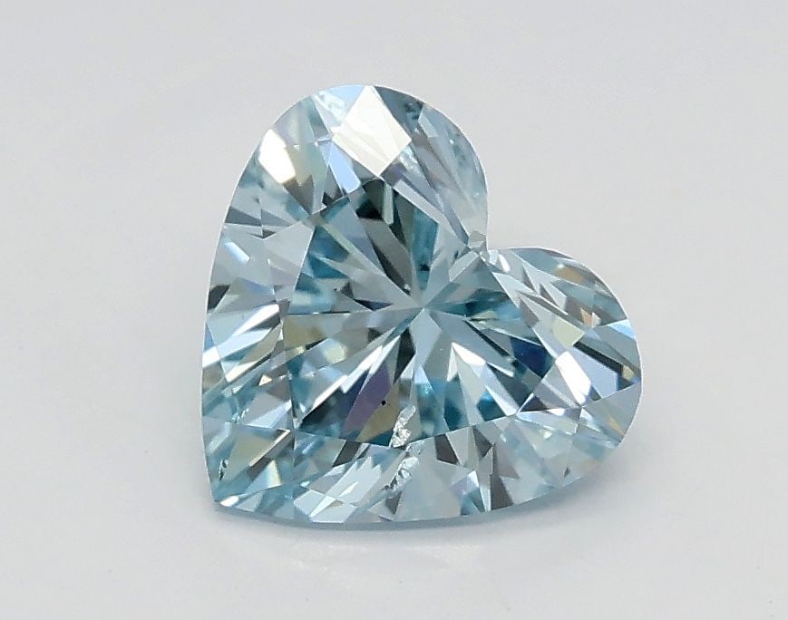 Loose Diamond - HEART 1.01ct Fancy Intense Greenish Blue SI1: Loose Diamond - HEART 1.01ct Fancy Intense Greenish Blue SI1 Source: This is a real non-mined Diamond that has been grown in a lab Shape: HEART Carats: 1.01 Color: Fancy Intense Greenish Blue Certific