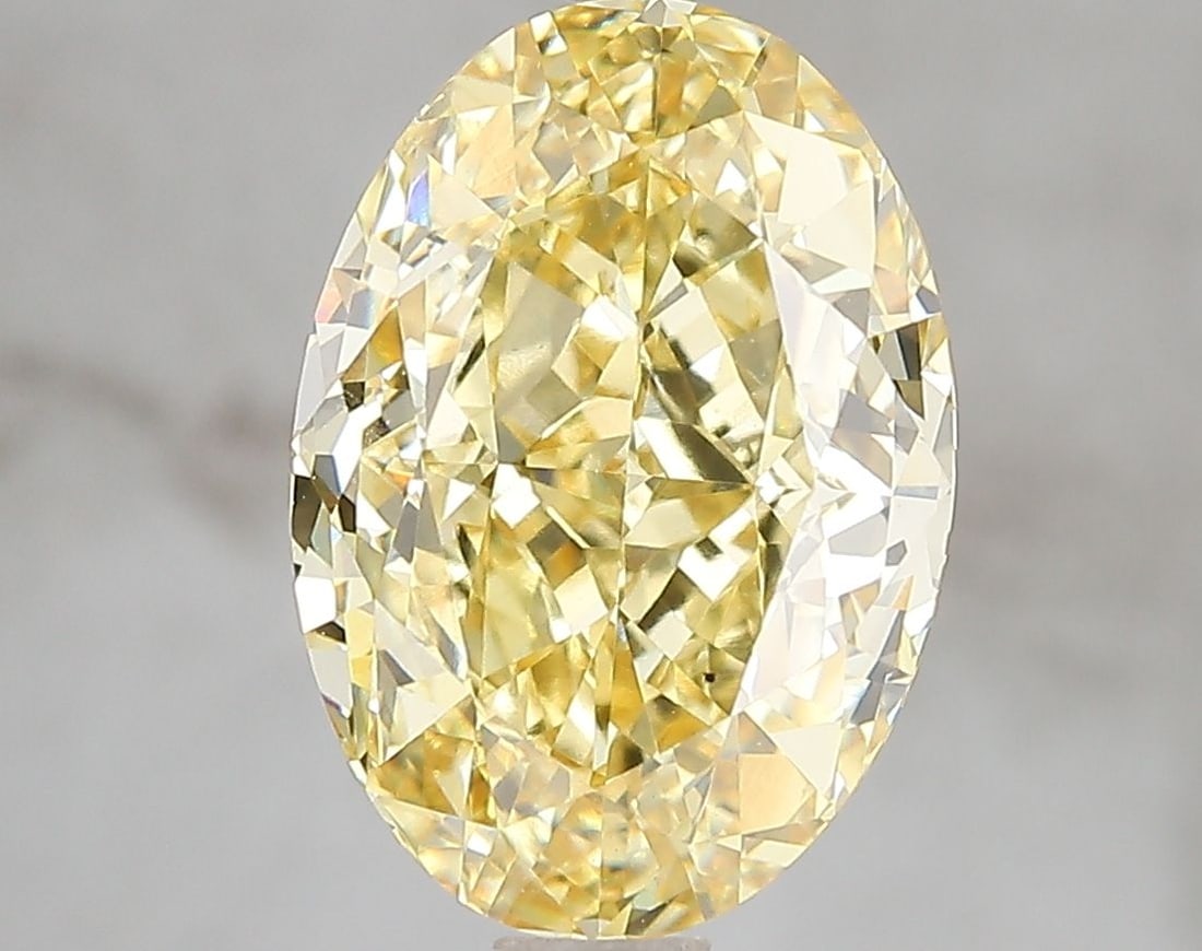 Loose Diamond - OVAL 4.59ct Fancy Vivid Yellow VS2: Loose Diamond - OVAL 4.59ct Fancy Vivid Yellow VS2 Source: This is a real non-mined Diamond that has been grown in a lab Shape: OVAL Carats: 4.59 Color: Fancy Vivid Yellow Certification: IGI Video: