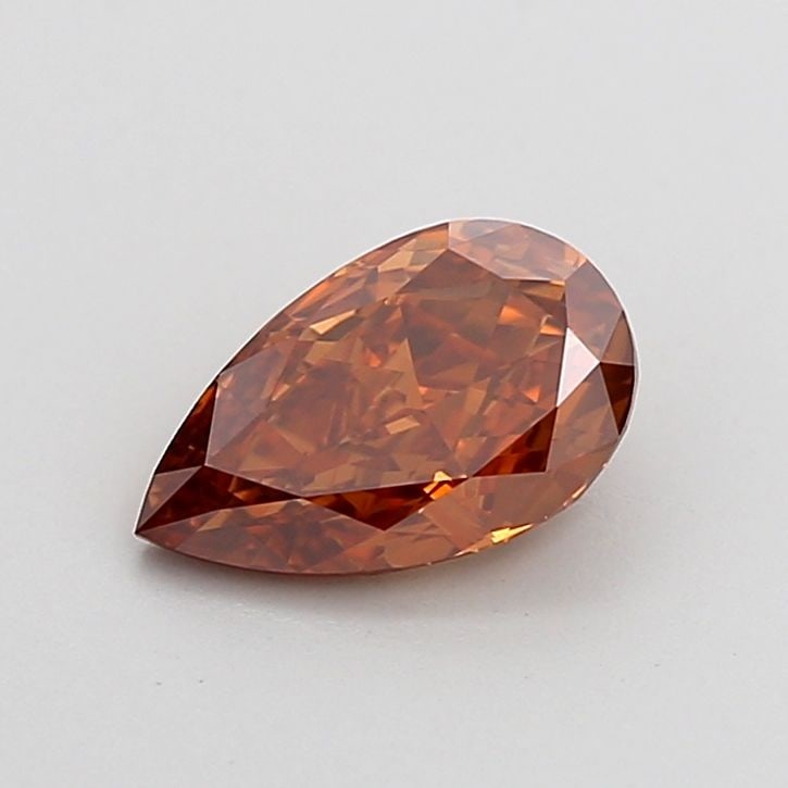 Loose Diamond - PEAR 1.0ct Fancy Vivid Orange VS1: Loose Diamond - PEAR 1.0ct Fancy Vivid Orange VS1 Source: This is a real non-mined Diamond that has been grown in a lab Shape: PEAR Carats: 1.0 Color: Fancy Vivid Orange Certification: IGI Video: