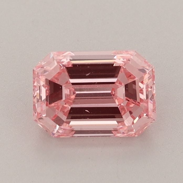 Loose Diamond - EMERALD 0.95ct Fancy Vivid Pink VS2: Loose Diamond - EMERALD 0.95ct Fancy Vivid Pink VS2 Source: This is a real non-mined Diamond that has been grown in a lab Shape: EMERALD Carats: 0.95 Color: Fancy Vivid Pink Certification: IGI Video: