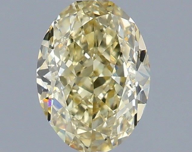 Loose Diamond - OVAL 1.02ct Fancy Yellow VVS2: Loose Diamond - OVAL 1.02ct Fancy Yellow VVS2 Source: This is a real non-mined Diamond that has been grown in a lab Shape: OVAL Carats: 1.02 Color: Fancy Yellow Certification: IGI Video: