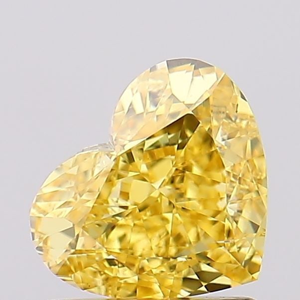 Loose Diamond - HEART 1.14ct Fancy Vivid Yellow VS2: Loose Diamond - HEART 1.14ct Fancy Vivid Yellow VS2 Source: This is a real non-mined Diamond that has been grown in a lab Shape: HEART Carats: 1.14 Color: Fancy Vivid Yellow Certification: IGI Video: