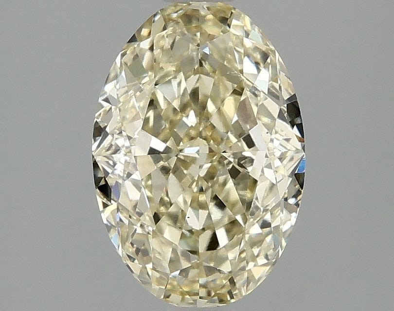 Loose Diamond - OVAL 2.1ct Fancy Light Yellow VS2: Loose Diamond - OVAL 2.1ct Fancy Light Yellow VS2 Source: This is a real non-mined Diamond that has been grown in a lab Shape: OVAL Carats: 2.1 Color: Fancy Light Yellow Certification: IGI Video: