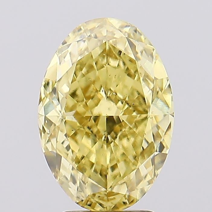 Loose Diamond - OVAL 4.15ct Fancy Vivid Yellow VS2: Loose Diamond - OVAL 4.15ct Fancy Vivid Yellow VS2 Source: This is a real non-mined Diamond that has been grown in a lab Shape: OVAL Carats: 4.15 Color: Fancy Vivid Yellow Certification: IGI Video: