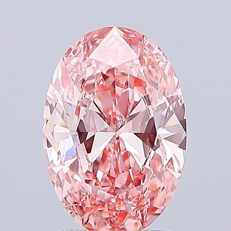 Loose Diamond - OVAL 2.06ct Fancy Vivid Pink VS1: Loose Diamond - OVAL 2.06ct Fancy Vivid Pink VS1 Source: This is a real non-mined Diamond that has been grown in a lab Shape: OVAL Carats: 2.06 Color: Fancy Vivid Pink Certification: IGI The Diamond D