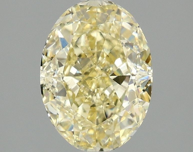 Loose Diamond - OVAL 2.1ct Fancy Intense Yellow VVS2: Loose Diamond - OVAL 2.1ct Fancy Intense Yellow VVS2 Source: This is a real non-mined Diamond that has been grown in a lab Shape: OVAL Carats: 2.1 Color: Fancy Intense Yellow Certification: IGI Video:
