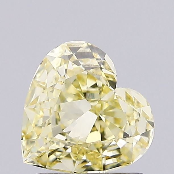 Loose Diamond - HEART 1.03ct Fancy Yellow VS1: Loose Diamond - HEART 1.03ct Fancy Yellow VS1 Source: This is a real non-mined Diamond that has been grown in a lab Shape: HEART Carats: 1.03 Color: Fancy Yellow Certification: IGI Video: