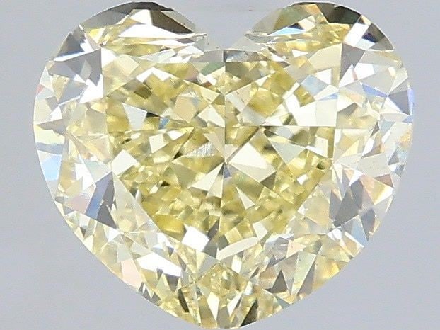 Loose Diamond - HEART 2.04ct Fancy Yellow VS2: Loose Diamond - HEART 2.04ct Fancy Yellow VS2 Source: This is a real non-mined Diamond that has been grown in a lab Shape: HEART Carats: 2.04 Color: Fancy Yellow Certification: IGI Video: