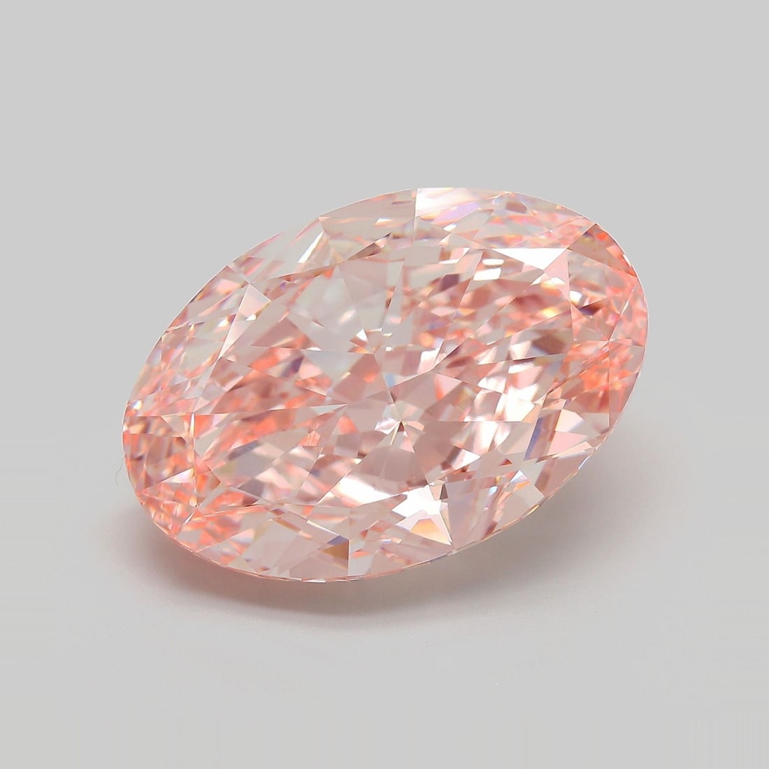 Loose Diamond - OVAL 20.23ct Fancy Intense Pink VVS2: Loose Diamond - OVAL 20.23ct Fancy Intense Pink VVS2 Source: This is a real non-mined Diamond that has been grown in a lab Shape: OVAL Carats: 20.23 Color: Fancy Intense Pink Certification: IGI Video: