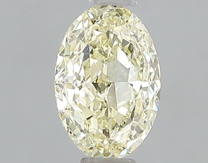 Loose Diamond - OVAL 1.01ct Fancy Light Yellow VVS2: Loose Diamond - OVAL 1.01ct Fancy Light Yellow VVS2 Source: This is a real non-mined Diamond that has been grown in a lab Shape: OVAL Carats: 1.01 Color: Fancy Light Yellow Certification: IGI Video: