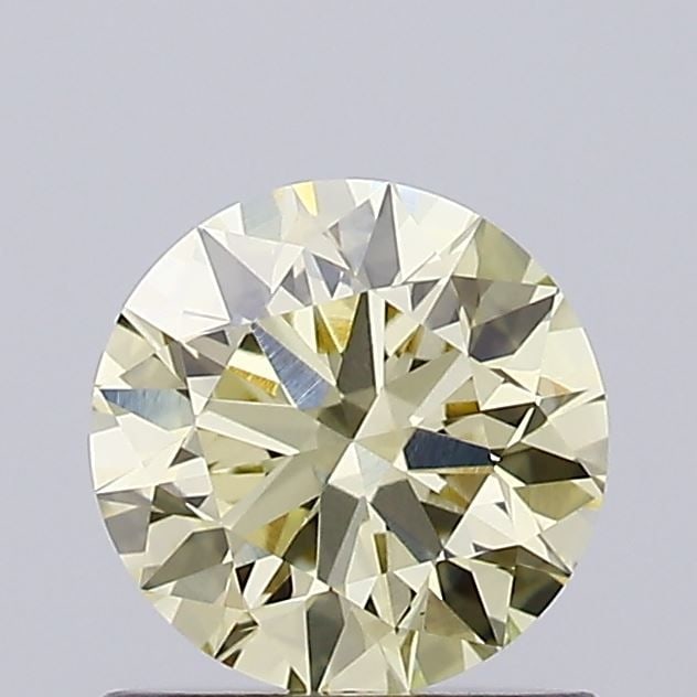 Loose Diamond - ROUND 0.88ct Fancy Light Yellow VVS2: Loose Diamond - ROUND 0.88ct Fancy Light Yellow VVS2 Source: This is a real non-mined Diamond that has been grown in a lab Shape: ROUND Carats: 0.88 Color: Fancy Light Yellow Certification: IGI Video:
