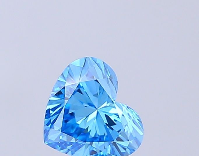 Loose Diamond - HEART 0.89ct Fancy Vivid Blue VVS2: Loose Diamond - HEART 0.89ct Fancy Vivid Blue VVS2 Source: This is a real non-mined Diamond that has been grown in a lab Shape: HEART Carats: 0.89 Color: Fancy Vivid Blue Certification: IGI Video: