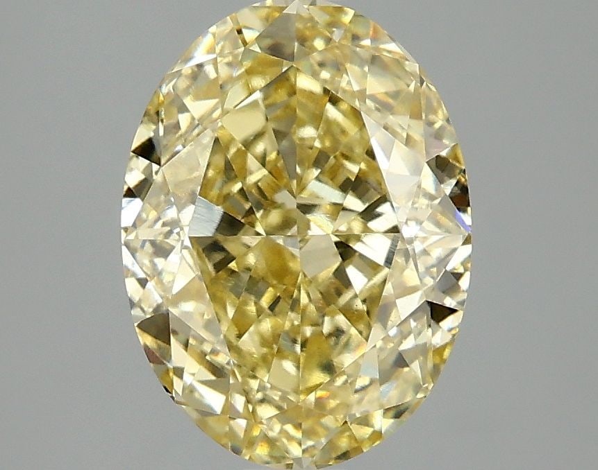 Loose Diamond - OVAL 3.06ct Fancy Intense Yellow VS1: Loose Diamond - OVAL 3.06ct Fancy Intense Yellow VS1 Source: This is a real non-mined Diamond that has been grown in a lab Shape: OVAL Carats: 3.06 Color: Fancy Intense Yellow Certification: IGI Video