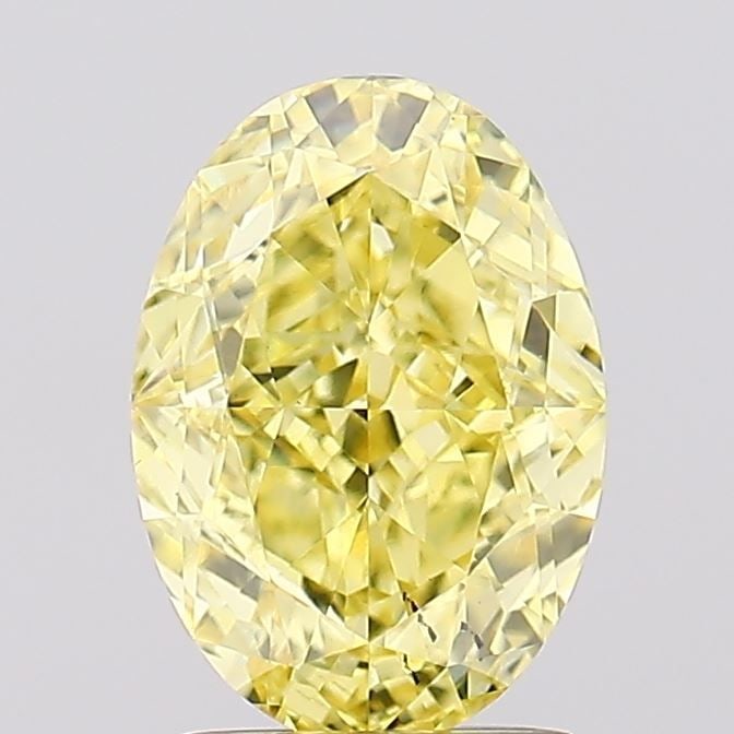 Loose Diamond - OVAL 2.19ct Fancy Vivid Yellow VS2: Loose Diamond - OVAL 2.19ct Fancy Vivid Yellow VS2 Source: This is a real non-mined Diamond that has been grown in a lab Shape: OVAL Carats: 2.19 Color: Fancy Vivid Yellow Certification: IGI Video:
