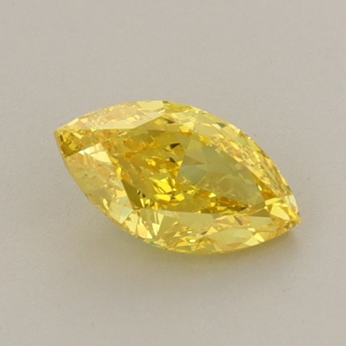 Loose Diamond - MARQUISE 0.65ct Fancy Vivid Yellow VVS1: Loose Diamond - MARQUISE 0.65ct Fancy Vivid Yellow VVS1 Source: This is a real non-mined Diamond that has been grown in a lab Shape: MARQUISE Carats: 0.65 Color: Fancy Vivid Yellow Certification: IGI 